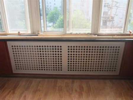 时给暖气片穿上了一层外衣--"暖气罩",使得整体的装修达到更好效果